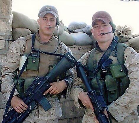 Hancock (right) in a photo on duty in Iraq