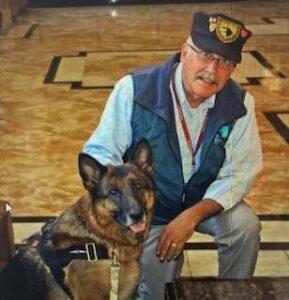 Jim Frost with a Military Working Dog