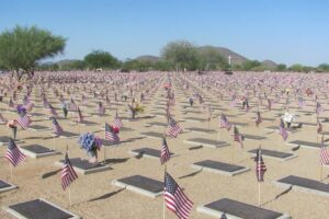 Gravesides display thousands of flags at the National Memorial Cemetery of Arizona.